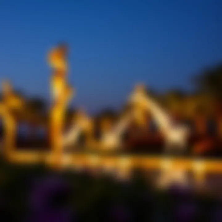 Evening view of illuminated sculptures in the park, enhancing the artistic ambiance