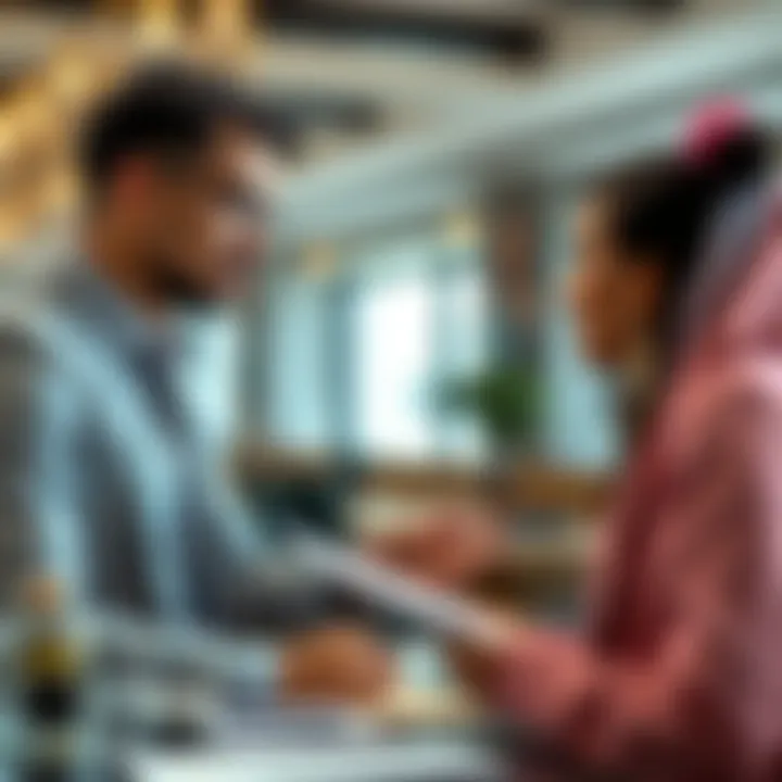 Real Estate Discussion A close-up of a real estate agent discussing terms with a client.